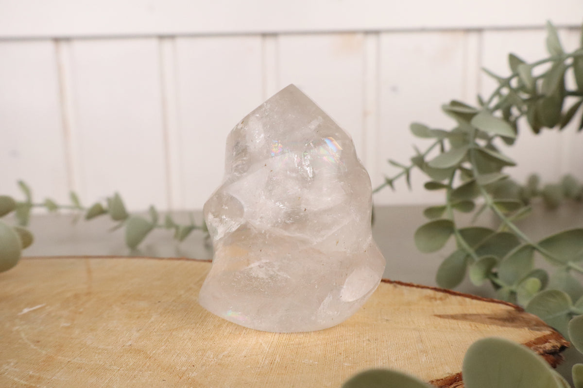 Heldere bergkristal vlam van 7,5 cm en 216 gram